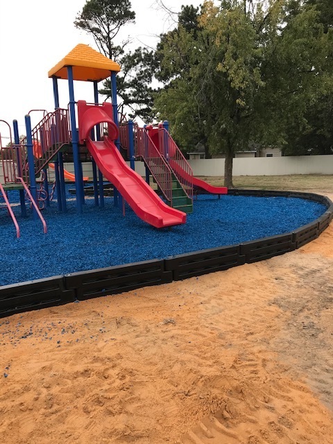 Playground resurfacing material.